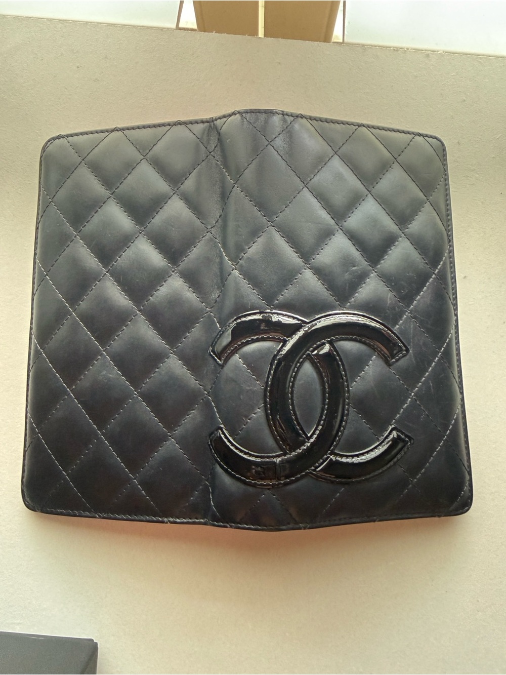 CHANEL Black Quilted Patent CC Phone Case